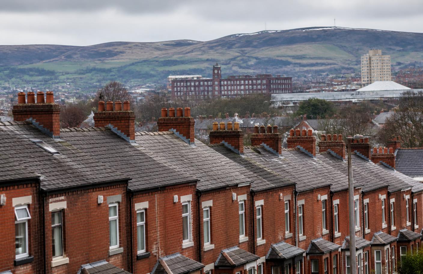 Terraced housing and hills across Tameside in Greater Manchester